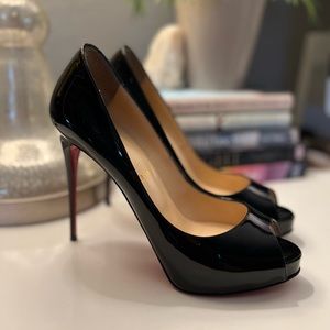 Christian Louboutin size 39.5 (fits about a size 8.5 womens)